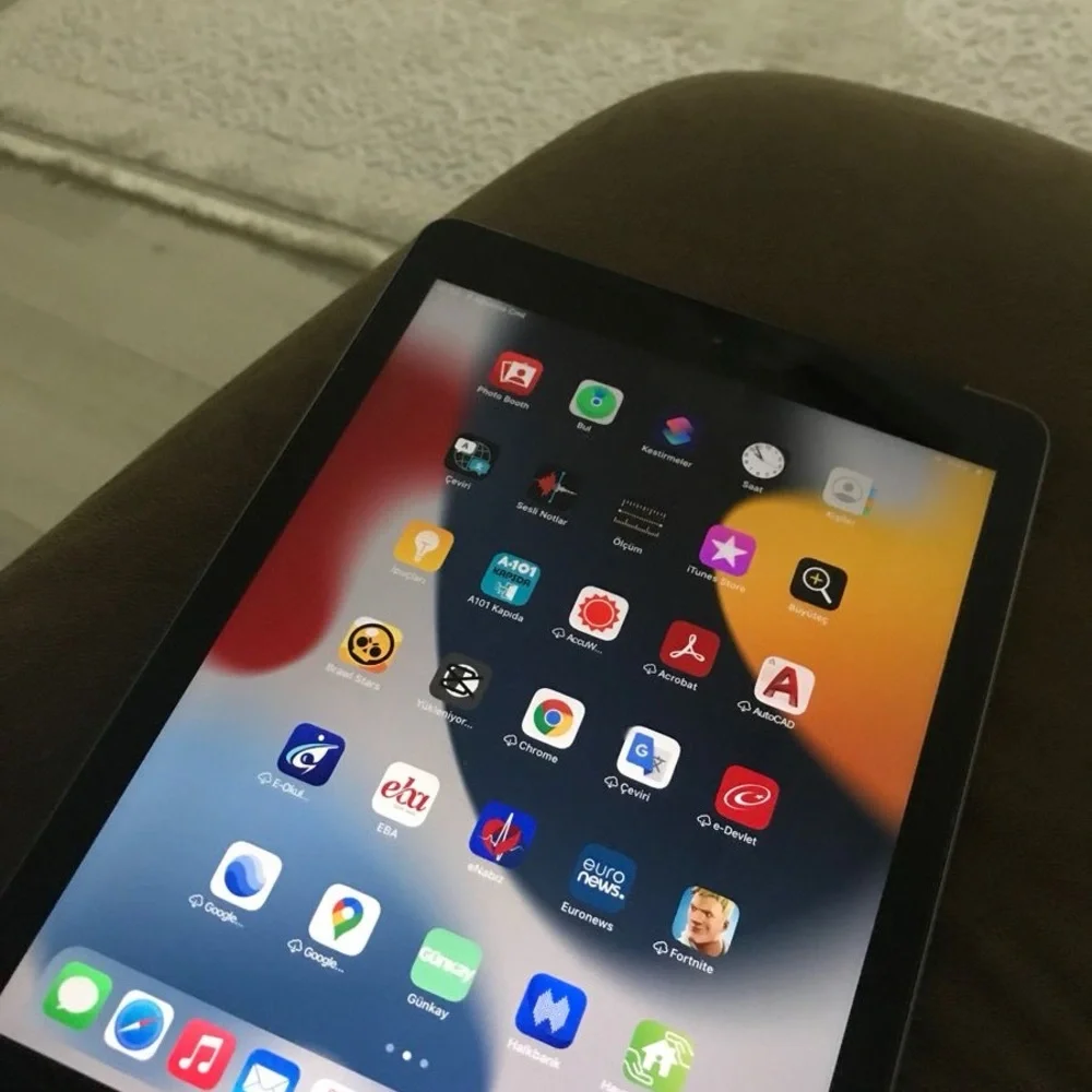 Apple Tablet with Vibrant Red and Blue Display